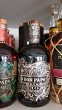 Load image into Gallery viewer, Don Papa Rum 10 Jahre limitiert neben Masskara Inn-out shop
